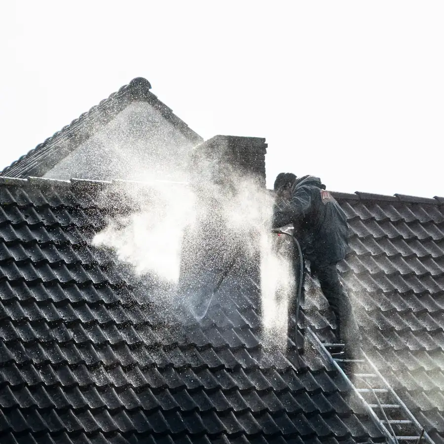 Pressure washing a tile roof